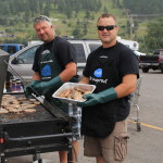 South Dakota Pork Producers cooking up sandwiches during Motorcycle Rally in downtown Sturgis