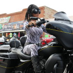 Woman in skin tight outfit on Main Street Sturgis