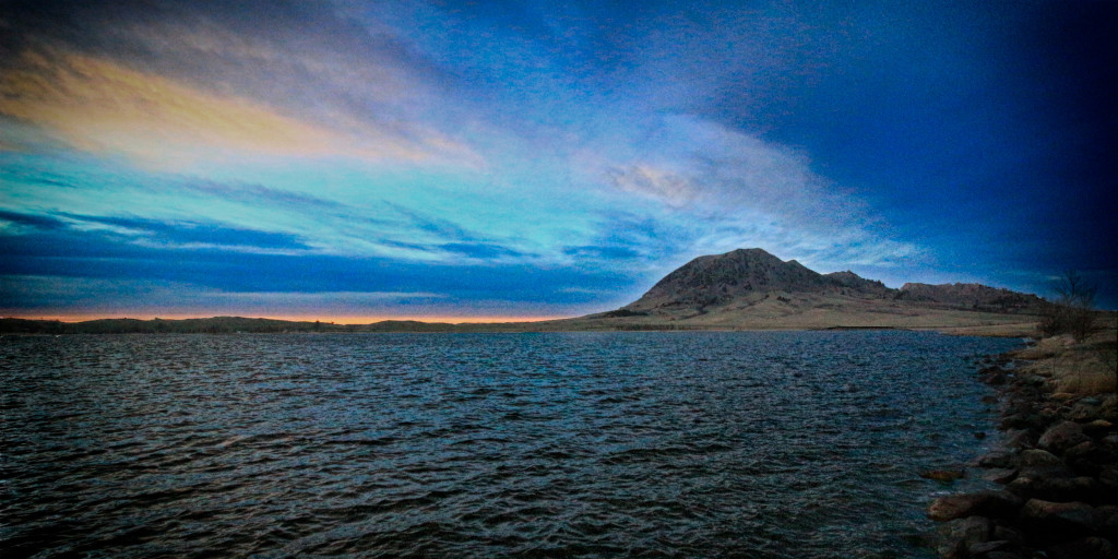 Bear Butte and Bear Butte Lake on an evening in April 2016