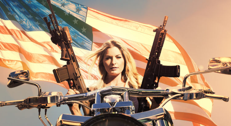 Woman Holds Automatic Weapons While Sitting on Motorcyle